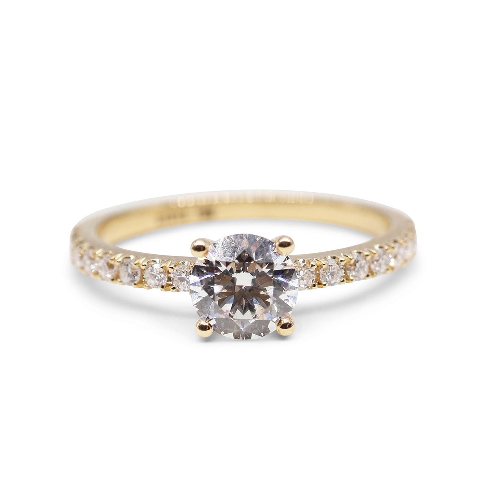 Anillo Solitario Oro 18 Kilates con Brazo de Diamantes y 4 Garras en V